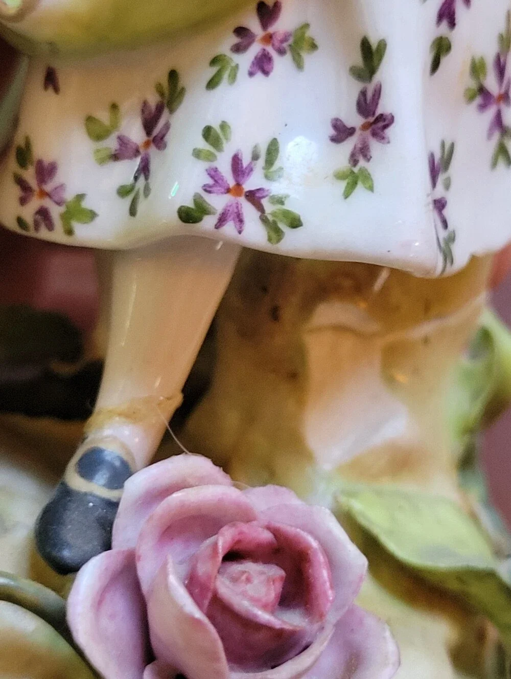 antique porcelain figurine, likely German from around 1900-repaired